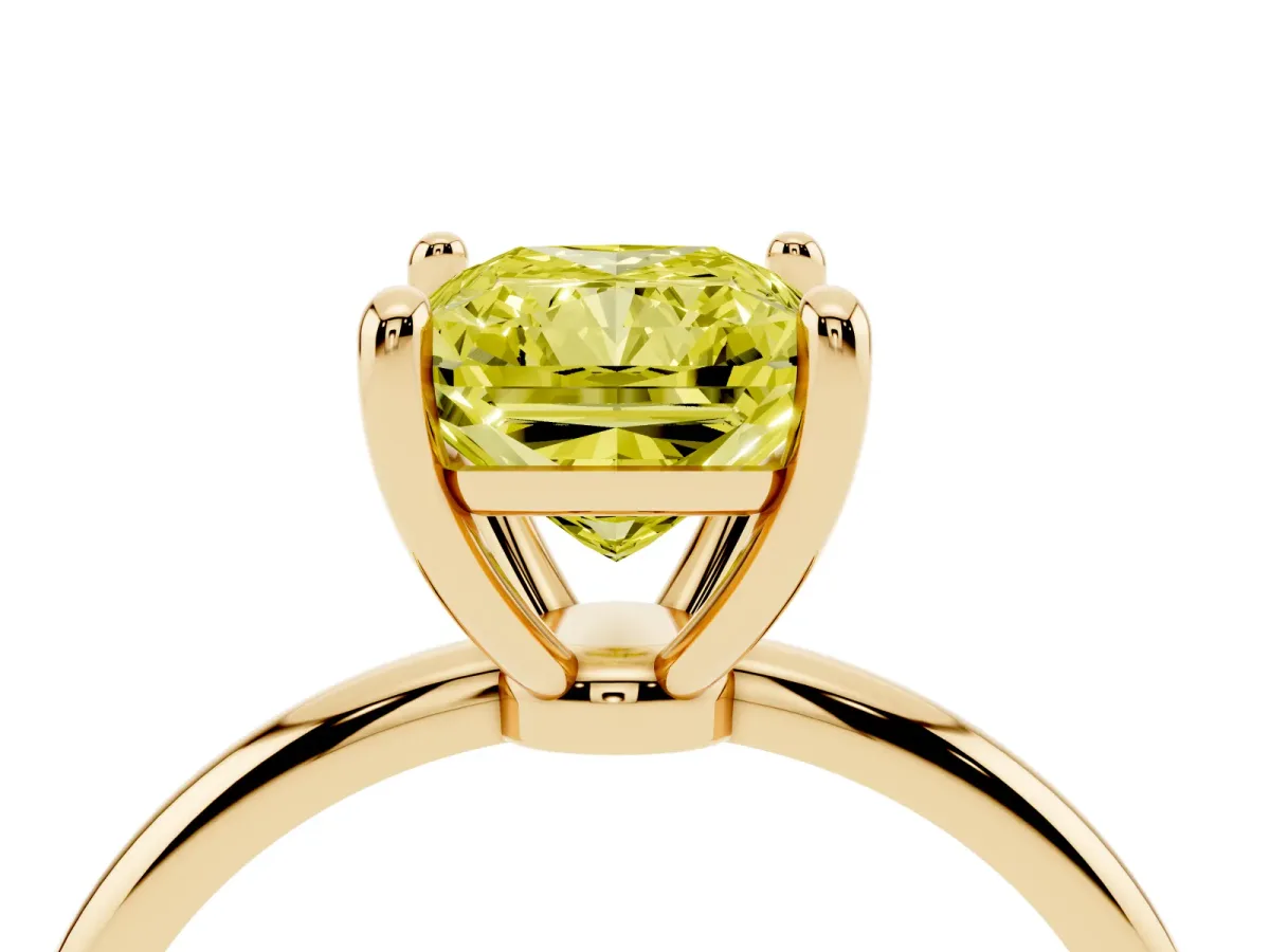 Fancy Yellow Radiant Cut Solitaire Diamond Ring with 4-Prong Setting on a Classic Band Yellow gold