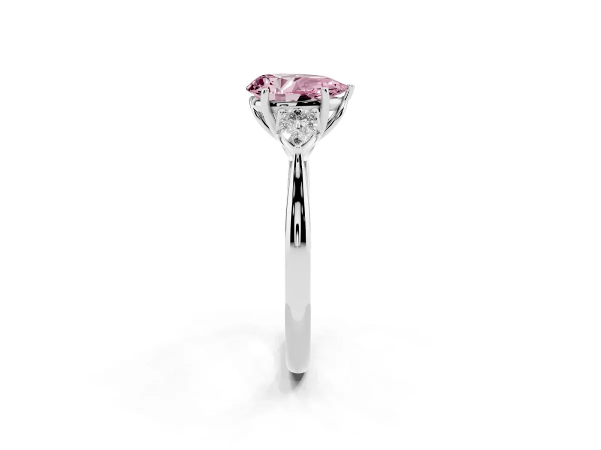 Fancy Pink Three-Stone Pear Cut Brilliant Diamond Solitaire Ring with Tapered Band and Four-Prong Setting White gold