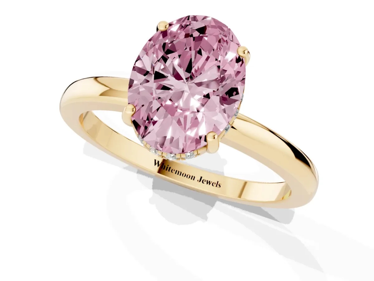 Fancy Pink Oval Cut Solitaire Diamond Ring with Prong Setting and Plain Band Yellow gold