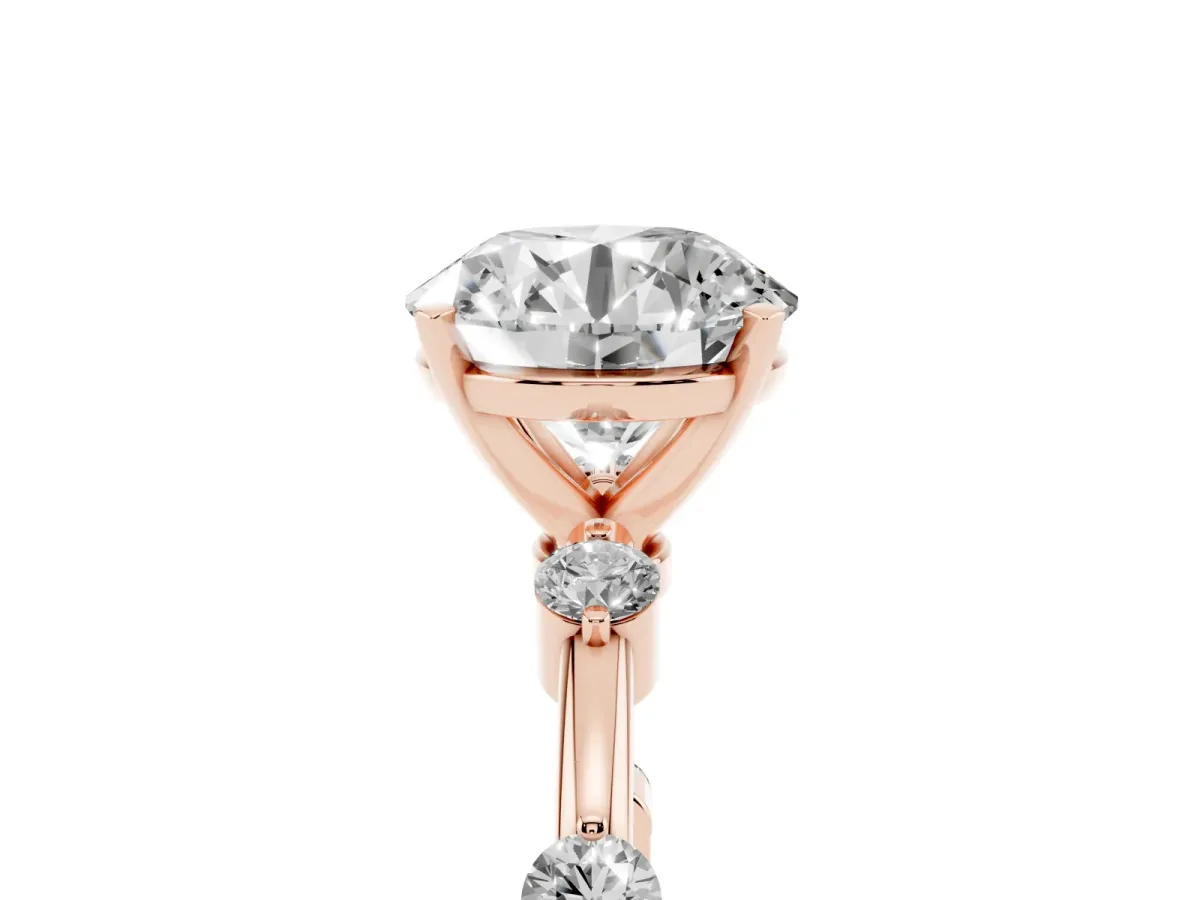 Round Cut Solitaire Diamond Ring with Bezel Set Side Stones and Prong Setting Rose gold