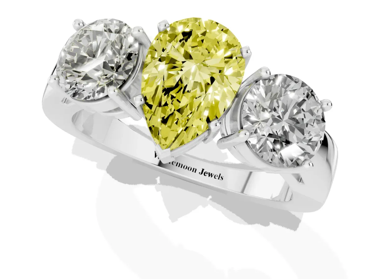 Fancy Yellow Three-Stone Pear Cut Diamond Ring with Round Side Stones, Classic Band, and Four-Prong Setting Platinum