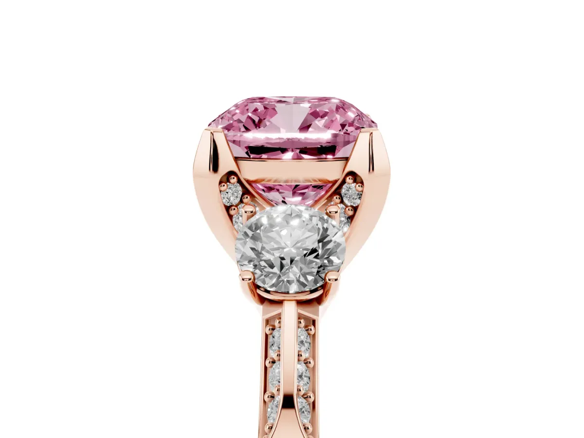 Fancy Pink Cushion Cut Brilliant Three-Stone Diamond Ring with Pavé Band and Four-Prong Setting Rose gold
