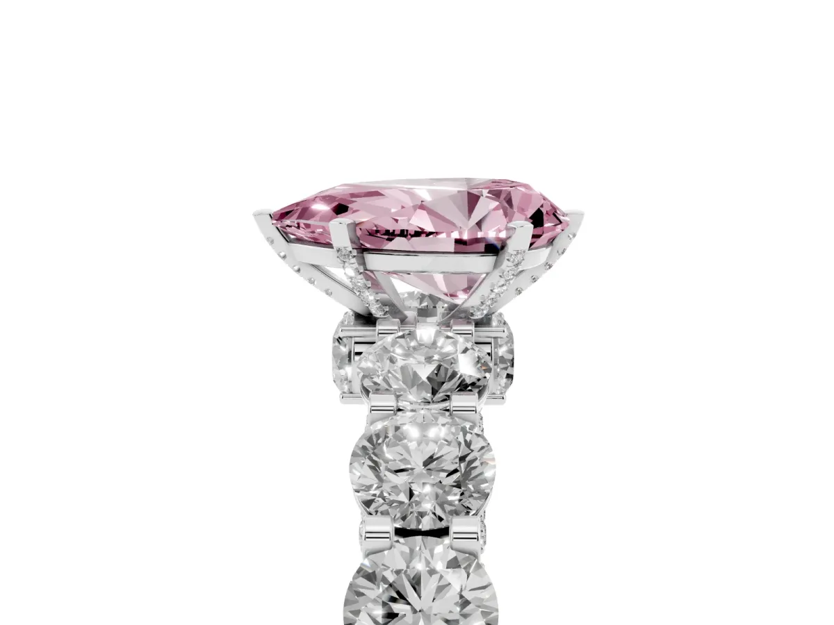 Fancy Pink Pear Cut Diamond Side Stone Engagement Ring with Four-Prong Setting Platinum