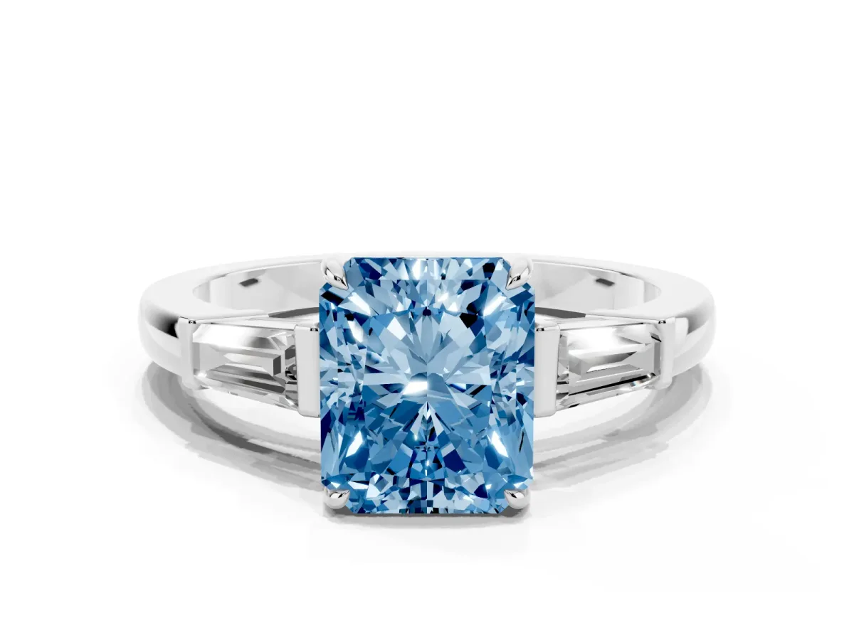 Fancy Blue Radiant Cut Diamond Three-Stone Ring with Tapered Baguette Side Stones and Prong Setting White gold