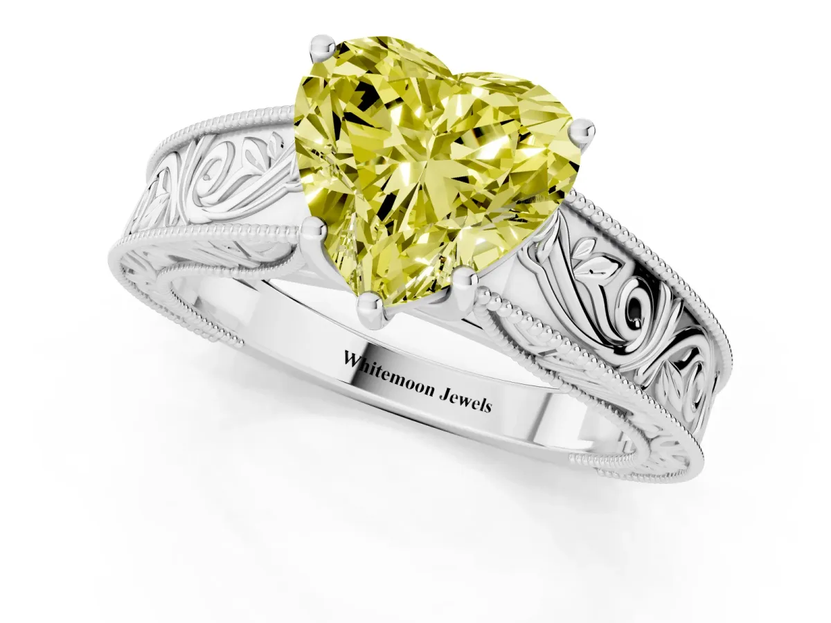 Fancy Yellow Heart Cut Diamond Solitaire Ring with Engraved Band and Four-Prong Setting White gold