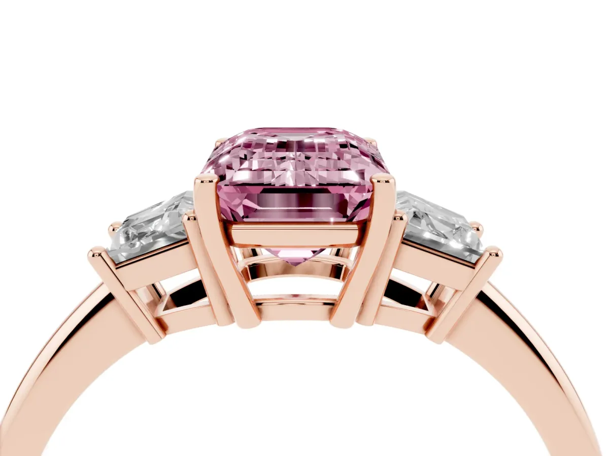 Fancy Pink Emerald Cut Diamond Three-Stone Ring with Trapezoid Side Stones and Prong Setting Rose gold