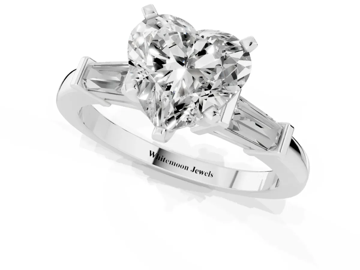 Heart Cut Cut Diamond Solitaire Ring with Tapered Baguette Accents and Four-Prong Setting White gold