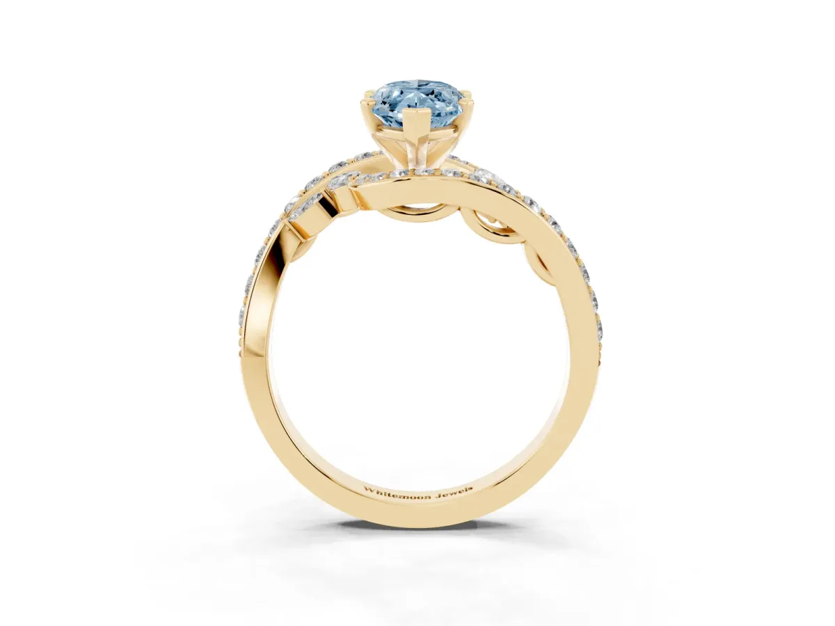 Fancy Blue Marquise Cut Solitaire with Pavé Twist Band and Four-Prong Setting Yellow gold