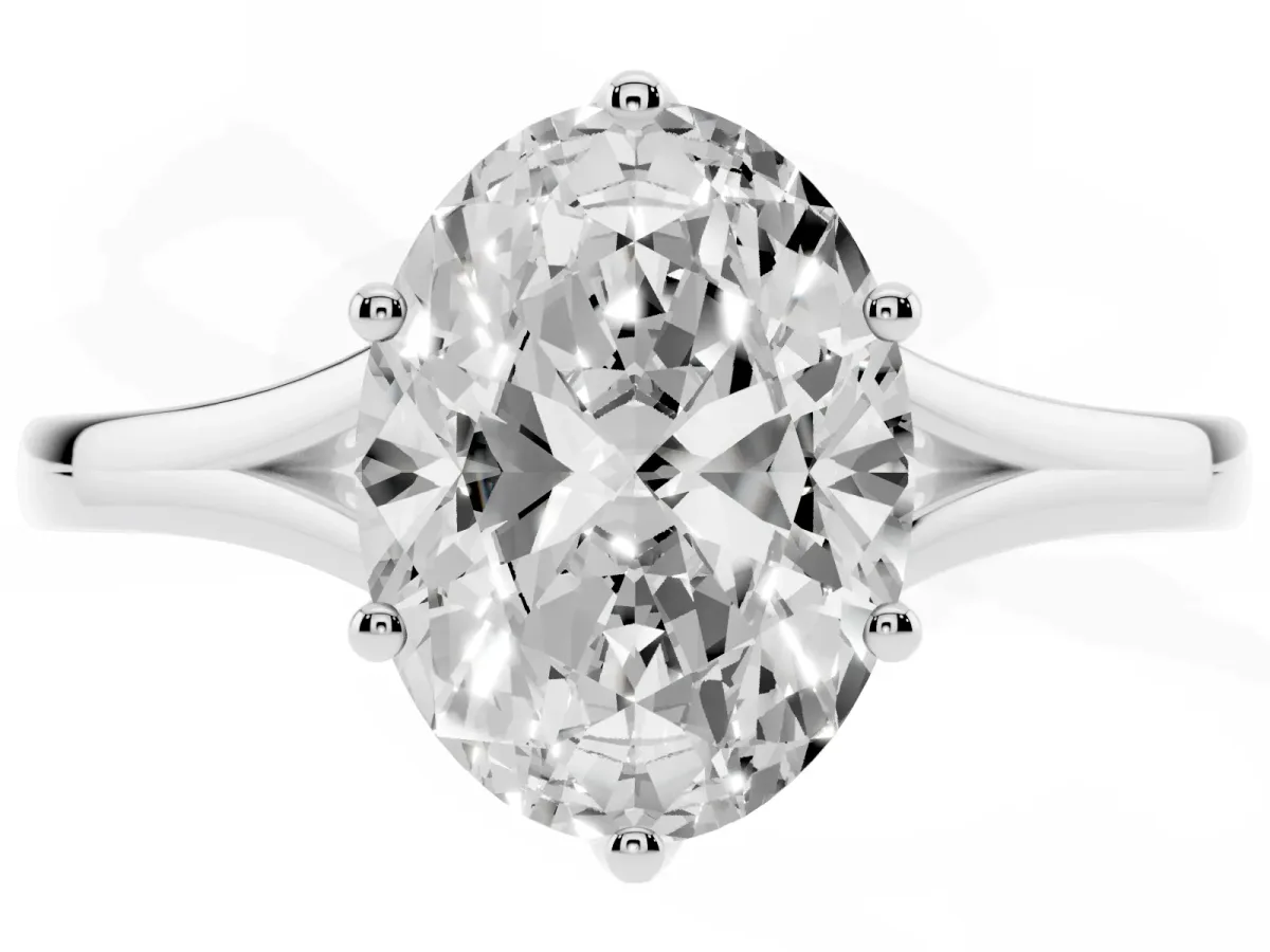 Oval Cut Solitaire Diamond Ring with Six-Prong Setting and Tapered Band Platinum