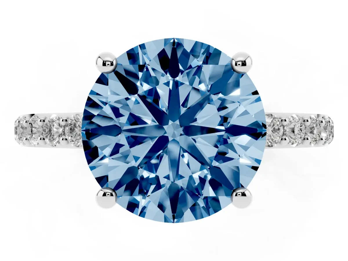 Fancy Blue Round Cut Diamond Solitaire Ring with Round Pavé Band and Prong Setting Silver