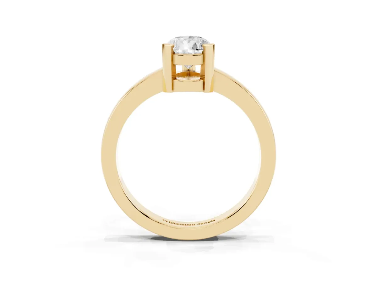 Pear Cut Cut Solitaire Ring with Four-Prong Setting and Classic Band Yellow gold