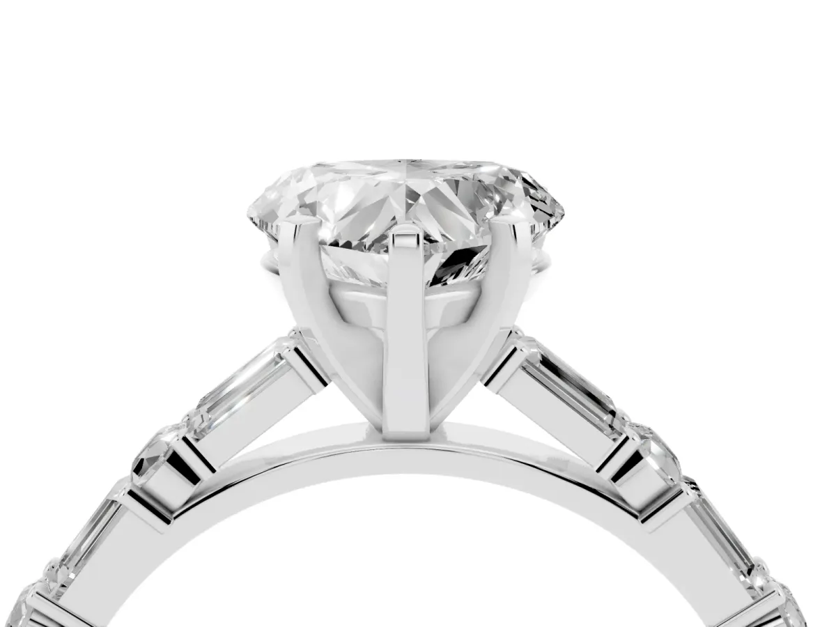 Heart Cut Diamond Solitaire with Side Baguettes and Channel Set Band Silver