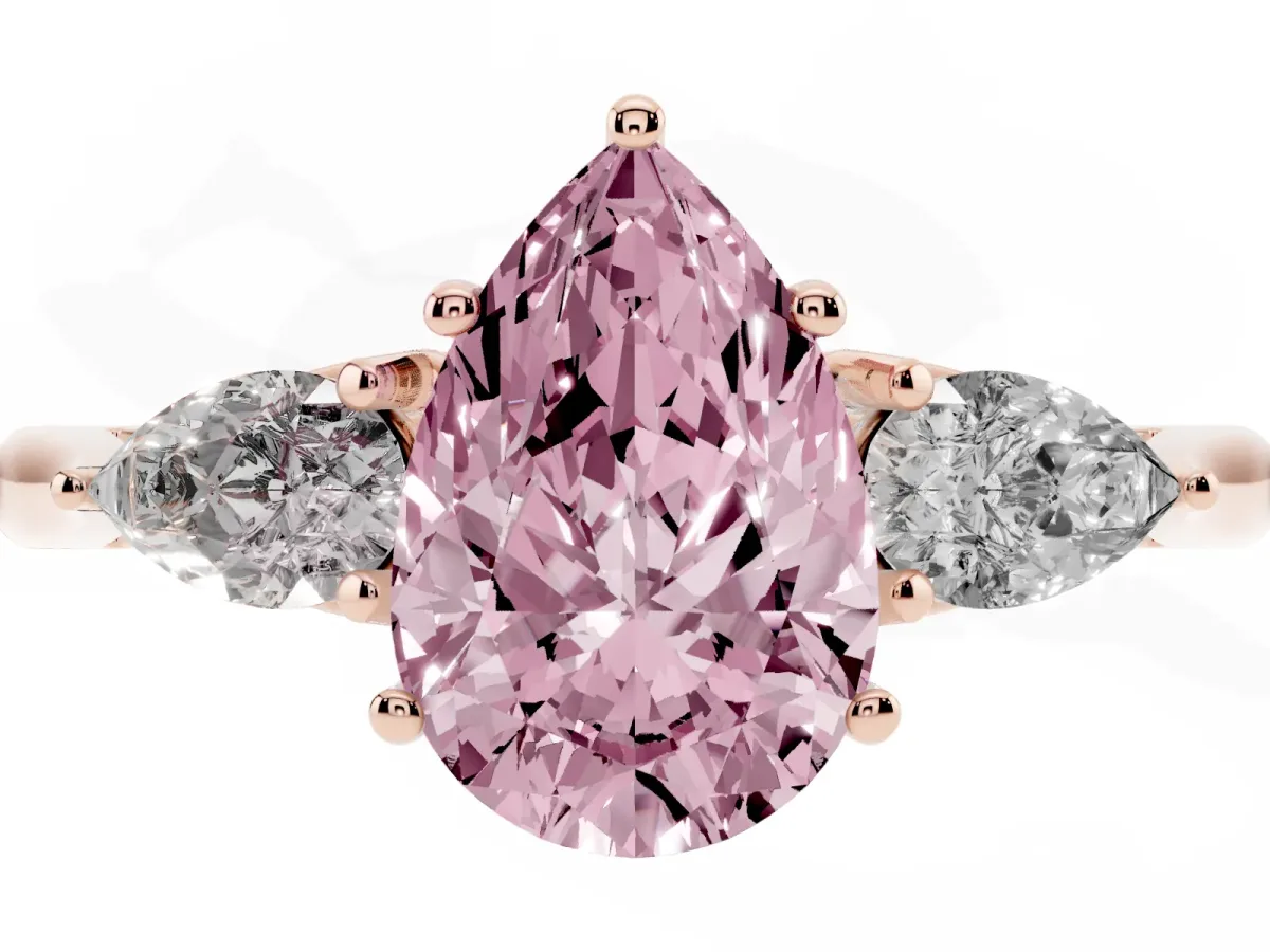 Fancy Pink Three-Stone Pear Cut Brilliant Diamond Solitaire Ring with Tapered Band and Four-Prong Setting Rose gold