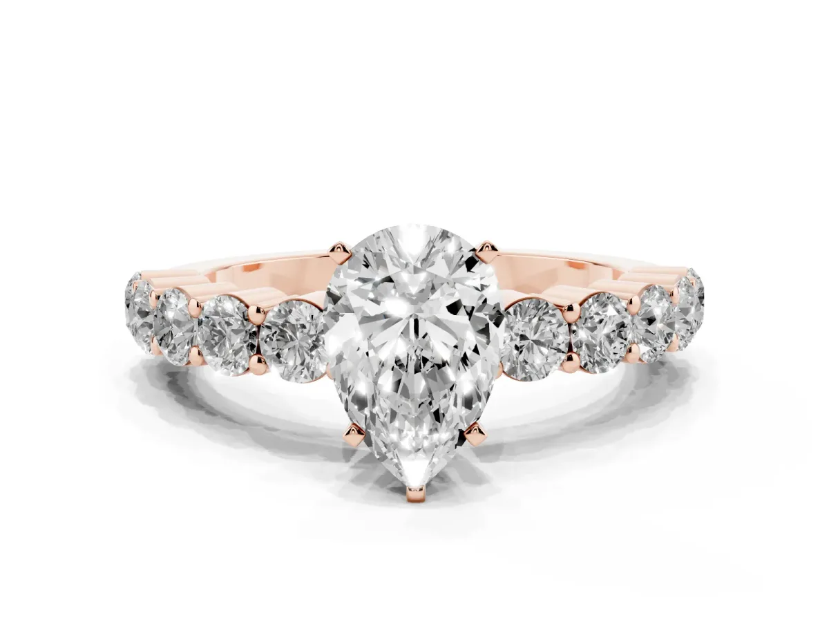 Pear Cut Diamond Solitaire Ring with Shared Prong Round Side Stones Rose gold