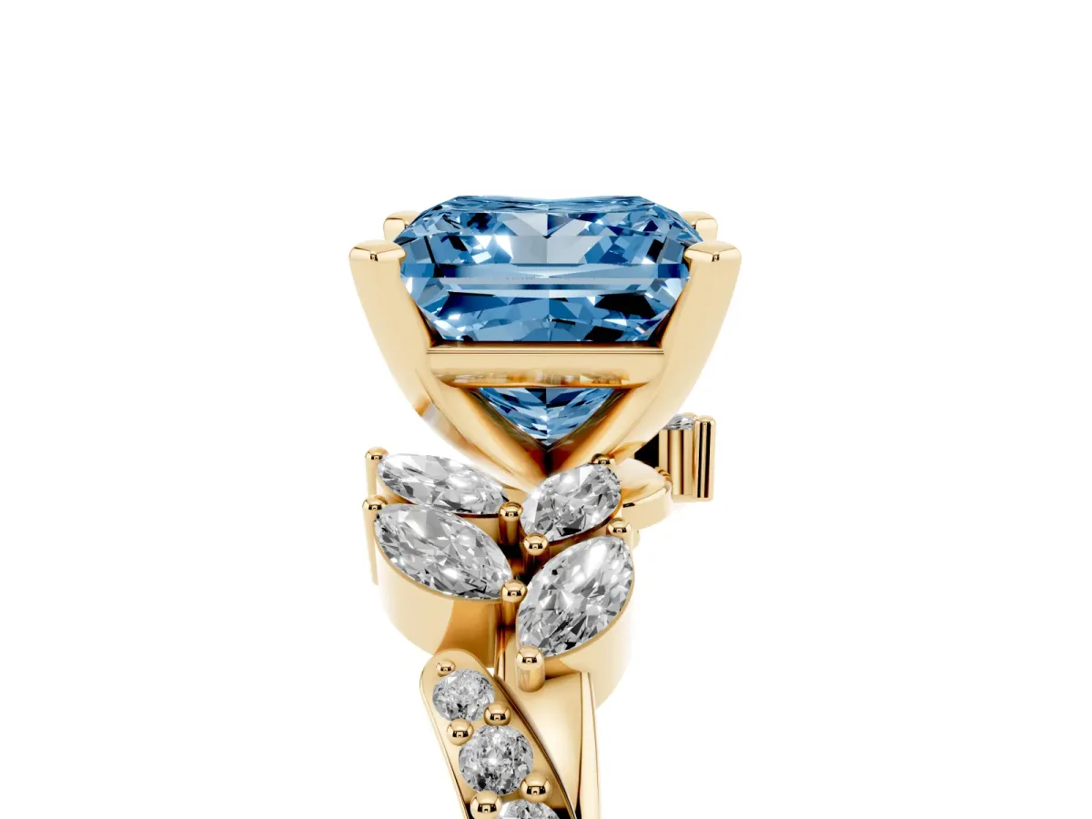 Fancy Blue Princess Cut Solitaire Marquise Twist Band with Six-Prong Setting Yellow gold