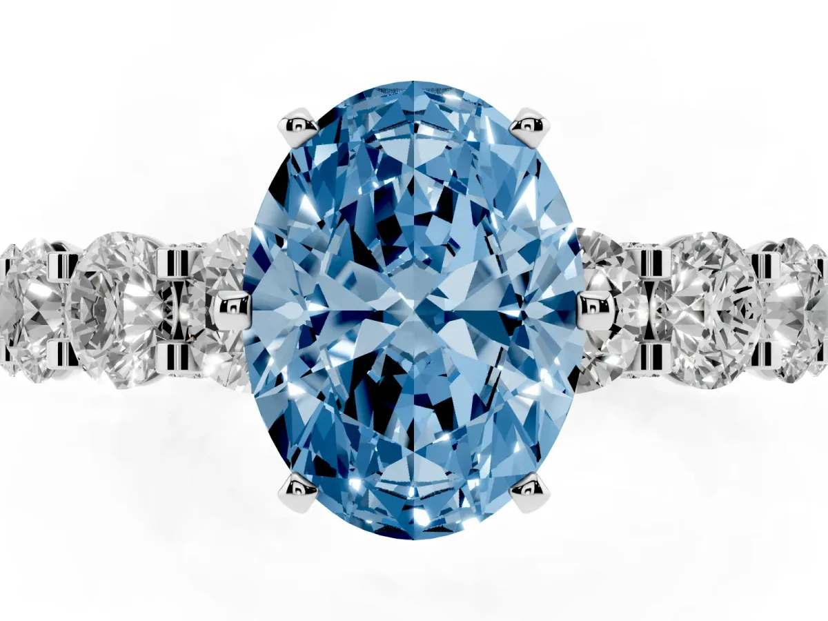 Fancy Blue Oval Cut Diamond Side Stone Engagement Ring with Four-Prong Setting Platinum