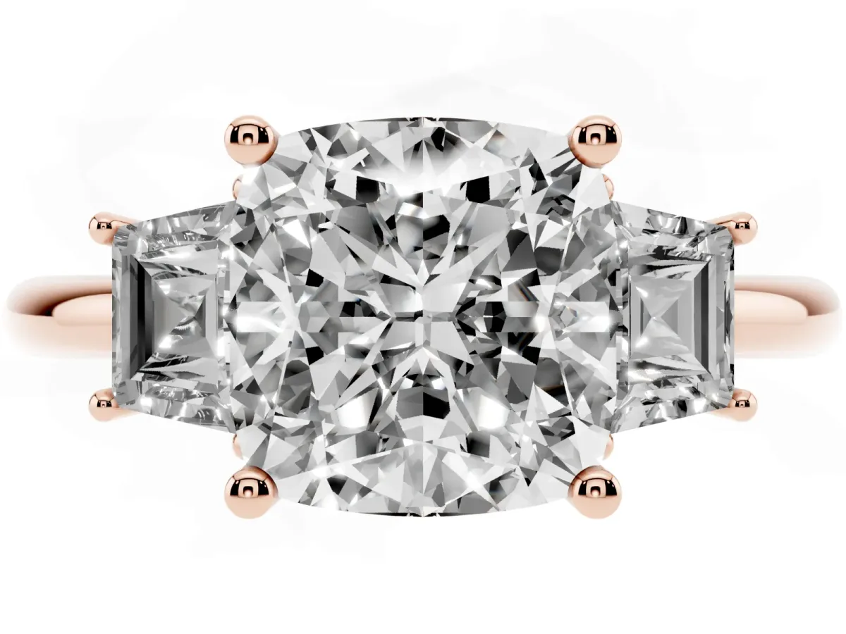 Cushion Cut Diamond Three-Stone Ring with Trapezoid Side Stones and Prong Setting Rose gold