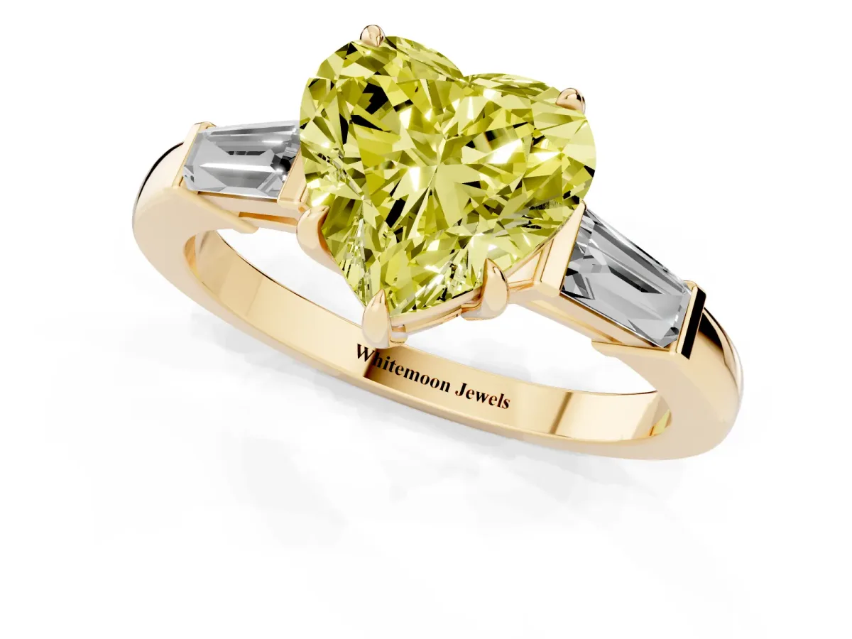 Fancy Yellow Heart Cut Diamond Three-Stone Ring with Tapered Baguette Side Stones and Prong Setting Yellow gold