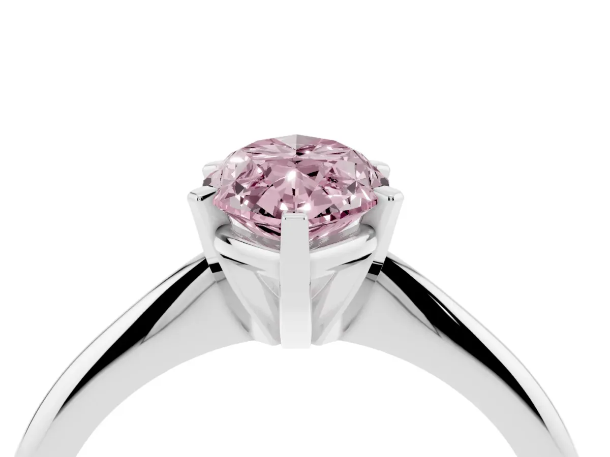 Fancy Pink Marquise Cut Cut Solitaire Ring with Four-Prong Setting on a Classic Band Silver