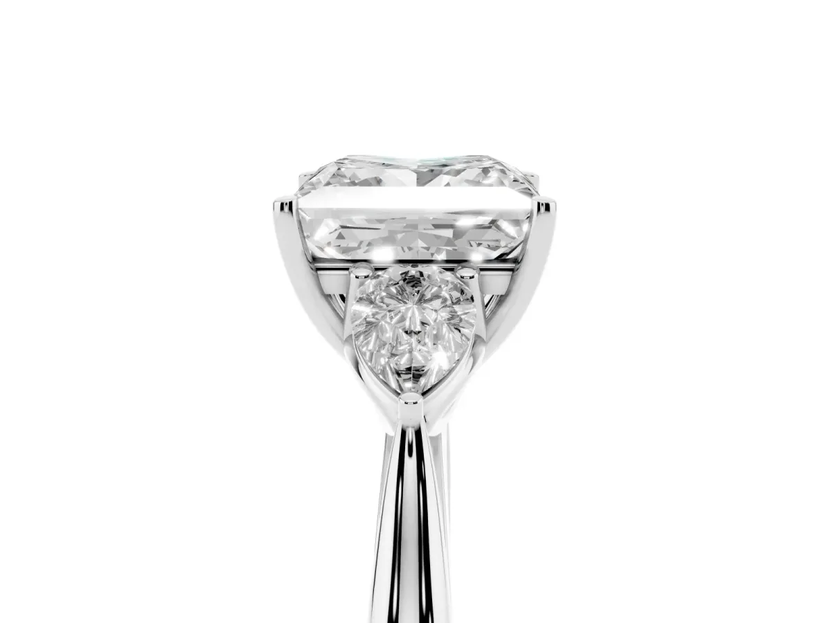 Three-Stone Princess Cut Diamond Ring with Pear Side Stones in Four-Prong Setting Silver