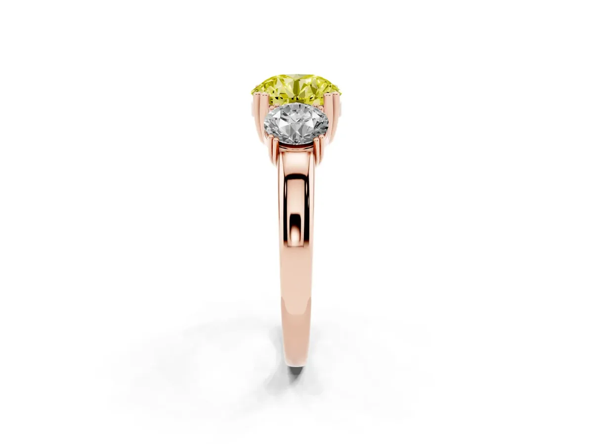 Fancy Yellow Three-Stone Round Cut Cut Diamond Ring with Channel Set Band and Four-Prong Setting Rose gold