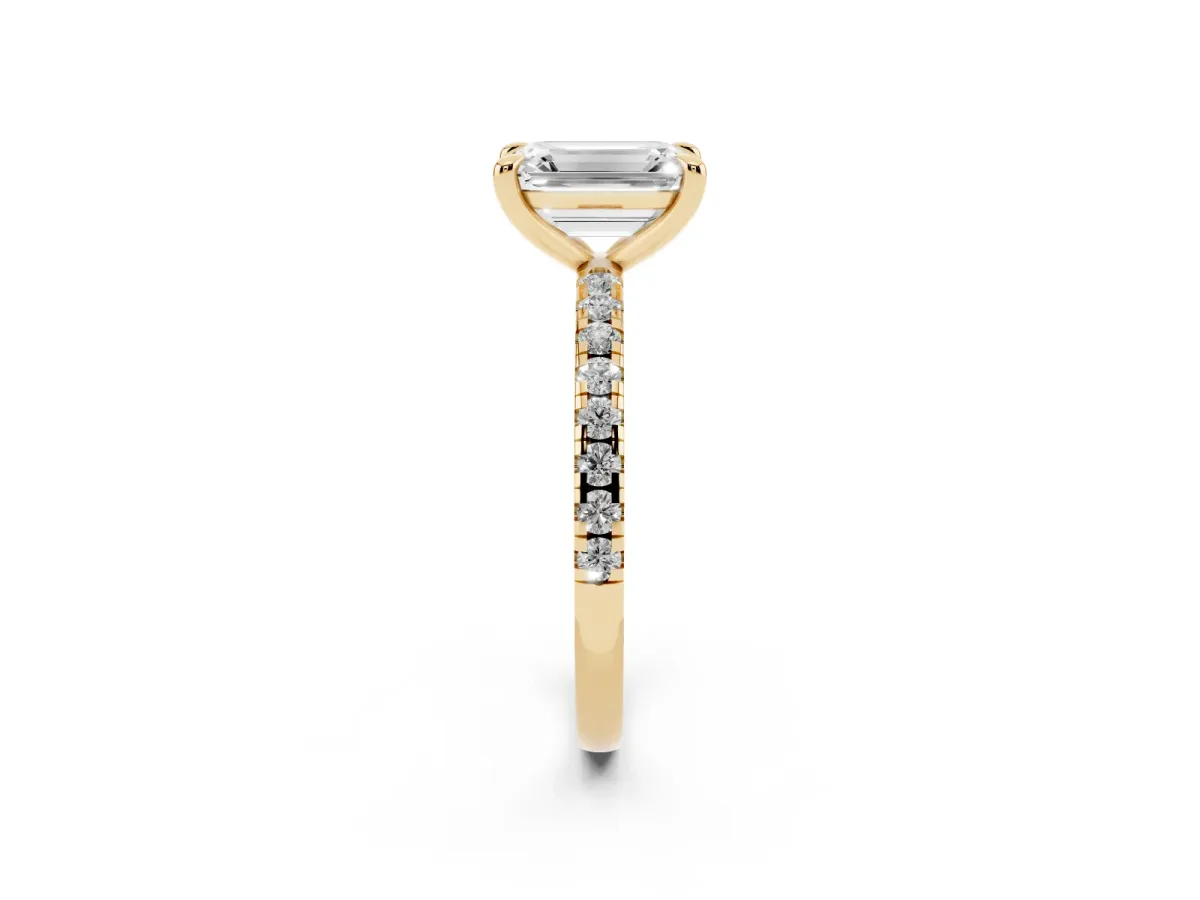 Emerald Cut Diamond Brilliant Solitaire Ring with Pavé Band and Four-Prong Setting Yellow gold