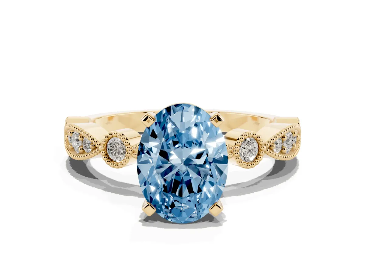 Fancy Blue Oval Cut Milgrain Bezel Diamond Engagement Ring with Solitaire Prong Setting Yellow gold