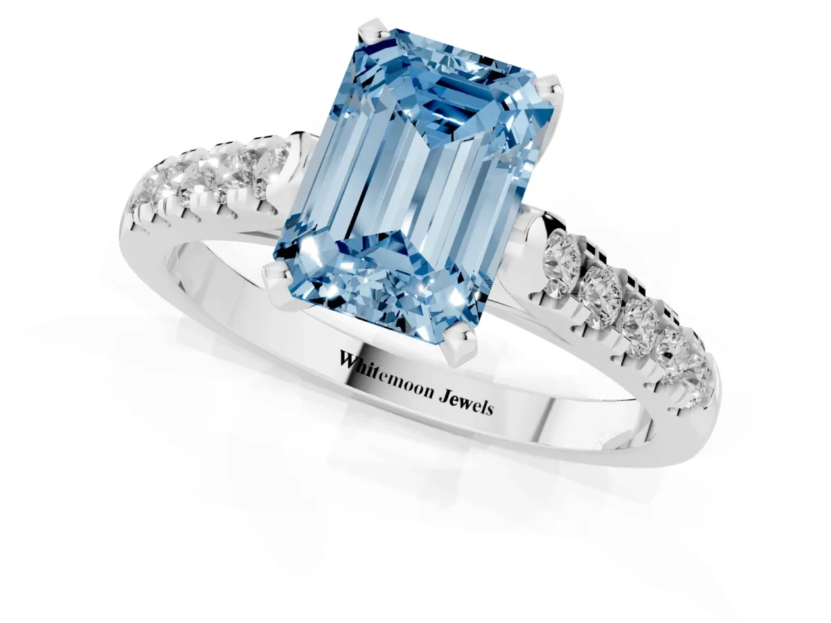 Fancy Blue Emerald Cut Diamond Pavé Band Solitaire Ring with Prong Setting Silver