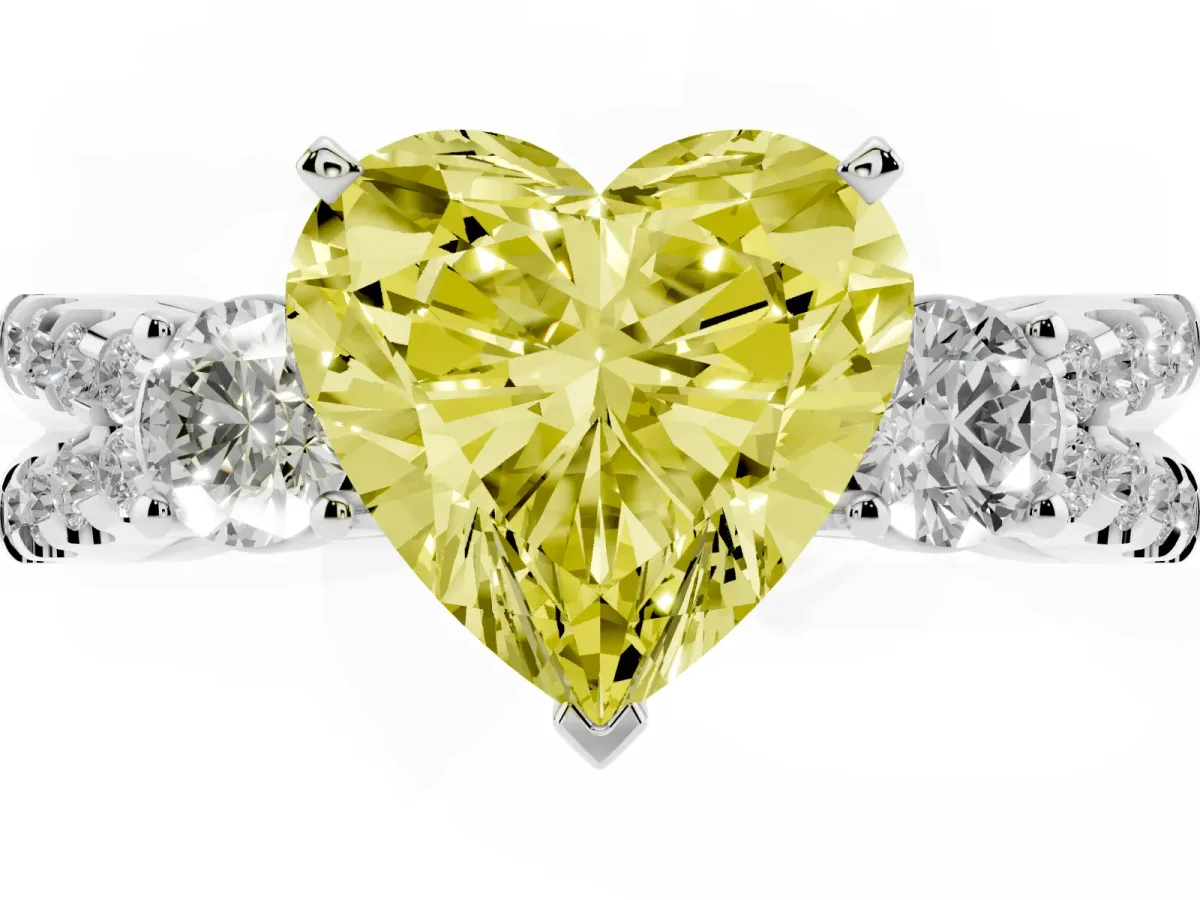 Fancy Yellow Heart Cut Diamond Three-Stone Ring with Pavé Split Shank and Four-Prong Setting Platinum