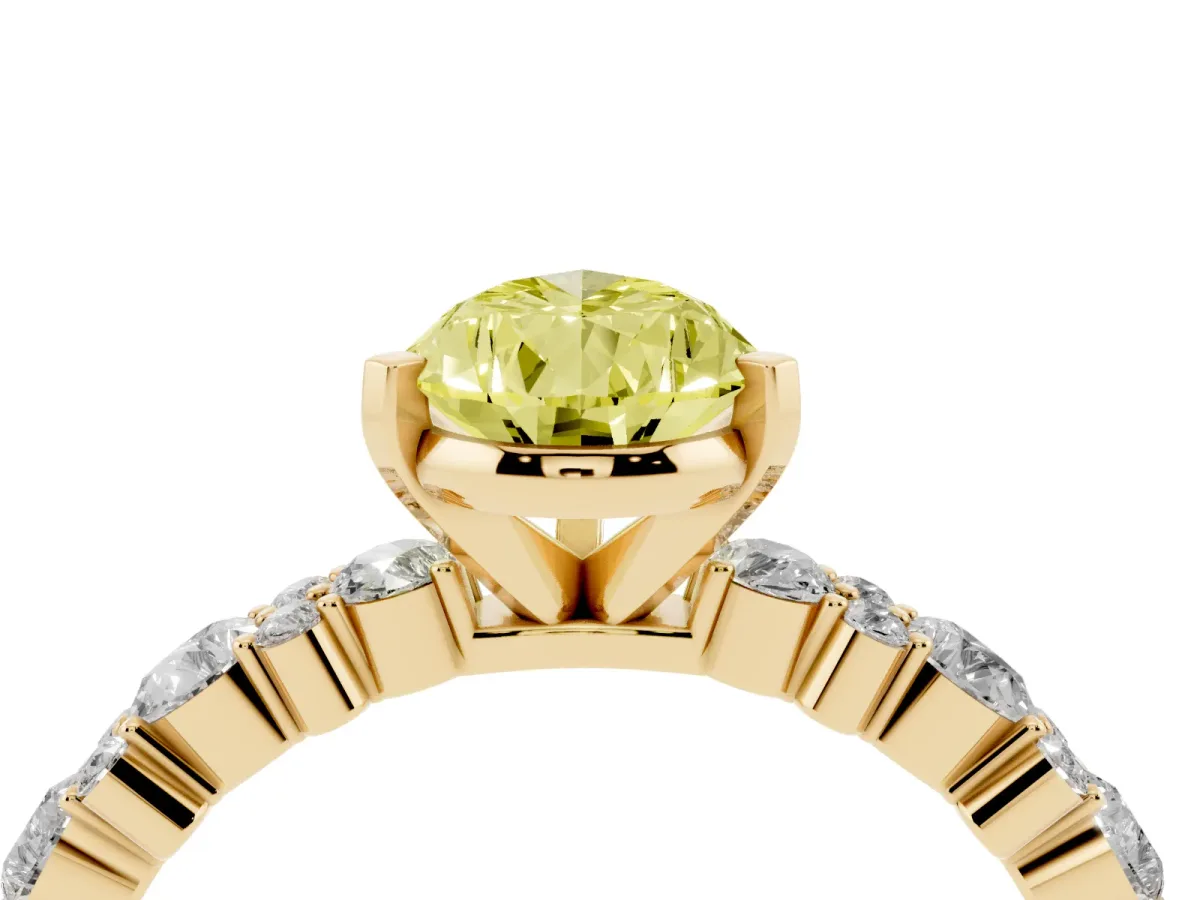 Fancy Yellow Pear Cut Diamond Side Stone Solitaire Ring with Round and Four-Prong Setting Yellow gold