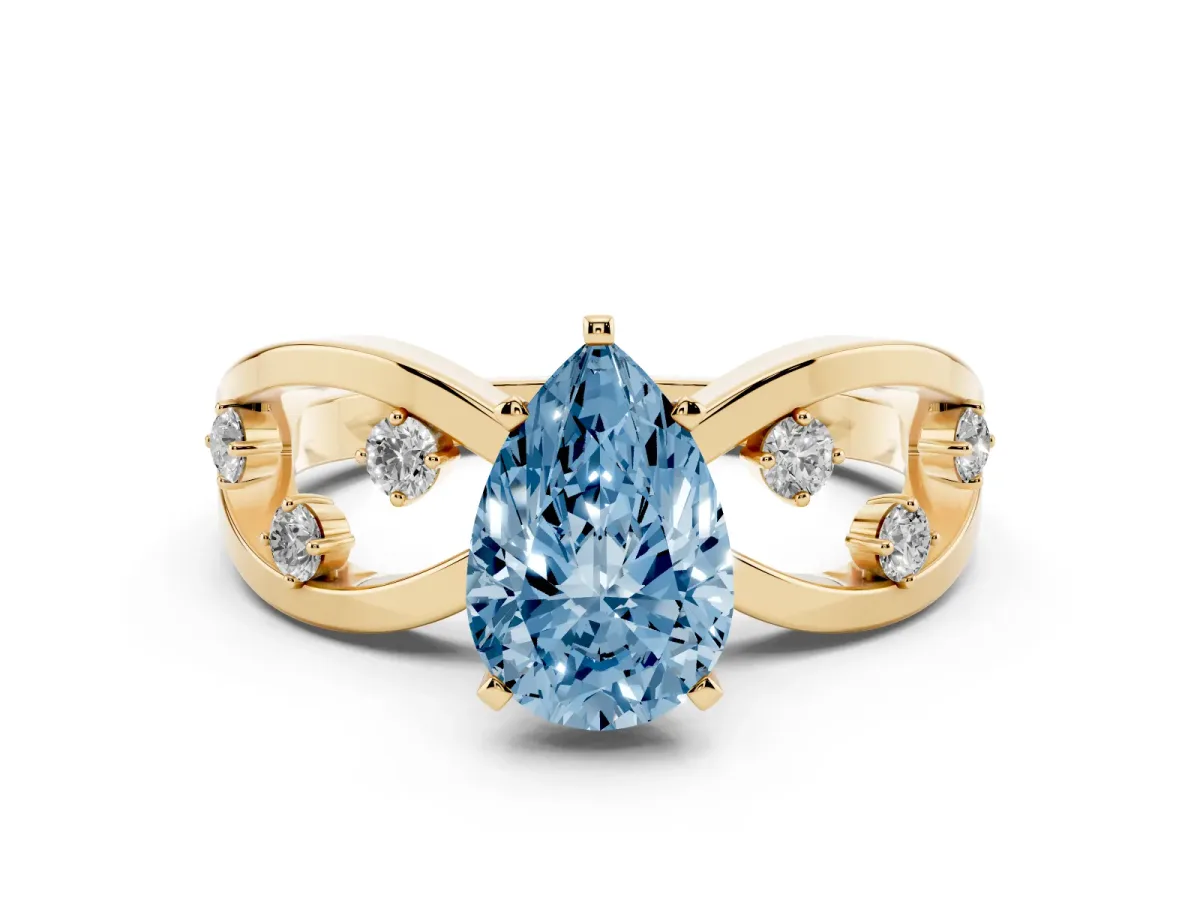Fancy Blue Pear Cut Cut Solitaire Diamond with Side Stones on Criss-Cross Band and Four-Prong Setting Yellow gold