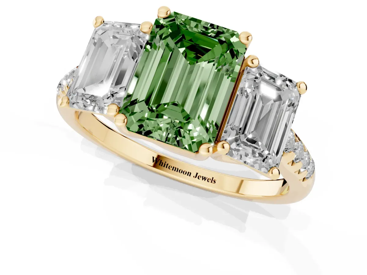 Fancy Green Three-Stone Emerald Cut Diamond Ring with Round Pavé Band and Prong Setting Yellow gold