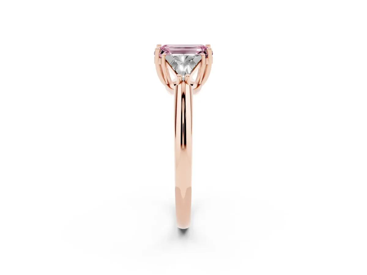 Fancy Pink Three-Stone Emerald Cut Diamond Engagement Ring with Trillion Side Stones and Prong Setting Rose gold