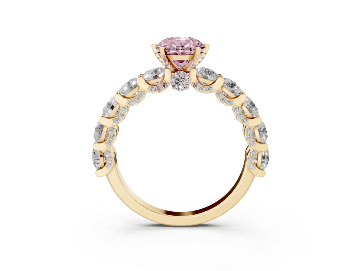 Fancy Pink Oval Cut Diamond Side Stone Engagement Ring with Four-Prong Setting Yellow gold