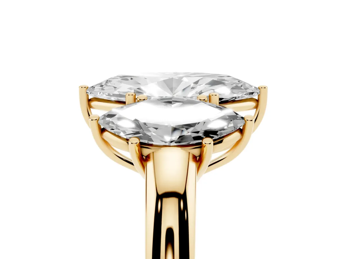 Marquise Cut Diamond Three-Stone Ring with Four-Prong Setting and Classic Band Yellow gold