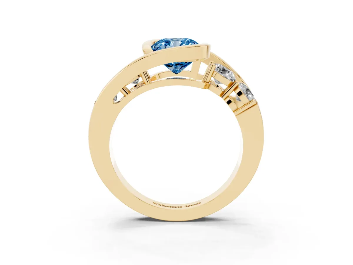 Fancy Blue Bezel Set Cushion Cut Diamond Bypass Ring with Round Accents Yellow gold