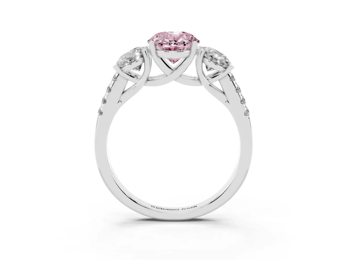 Fancy Pink Three-Stone Oval Cut Diamond Ring with Round Pavé Band and Prong Setting Silver