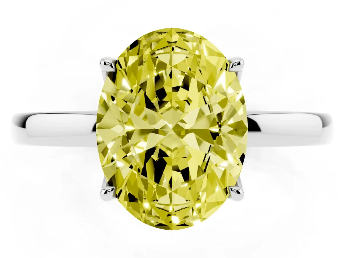 Fancy Yellow Oval Cut Diamond Solitaire Ring with Thin Band and Prong Setting Silver