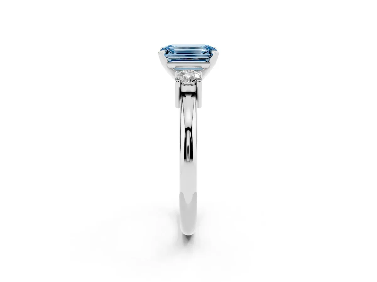 Fancy Blue Three-Stone Emerald Cut Cut Diamond Solitaire with Prong Setting and Classic Band Silver
