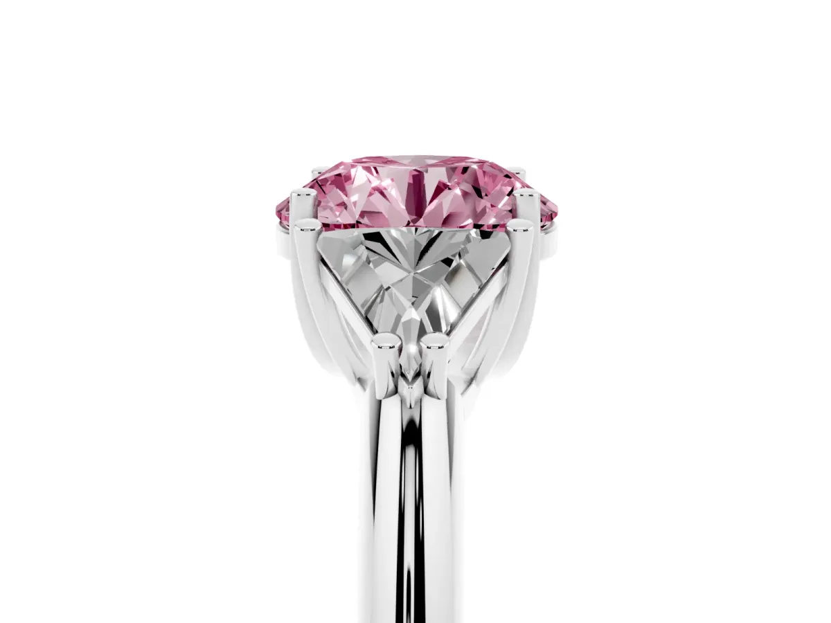 Fancy Pink Three-Stone Round Cut Diamond Engagement Ring with Trillion Side Stones and Prong Setting Silver