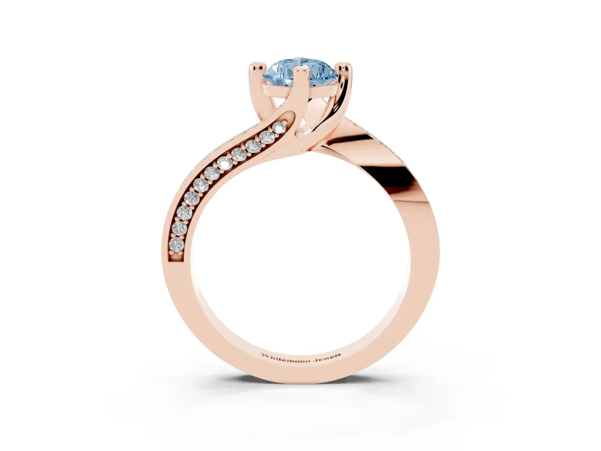 Fancy Blue Pear Cut Solitaire Diamond Twist Band with Pavé Setting and Four-Prong Setting Rose gold