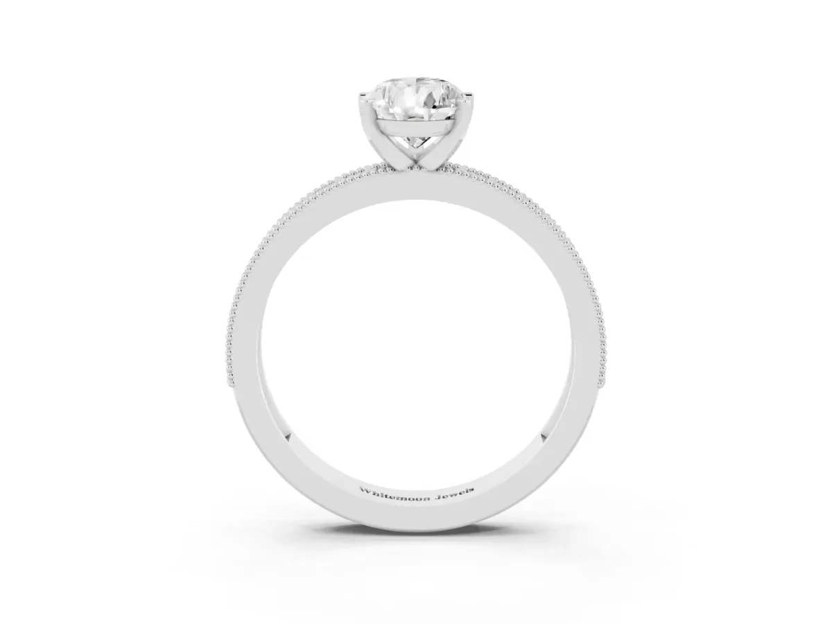 Pear Cut Diamond Milgrain Pavé Engagement Ring with Four-Prong Setting Silver
