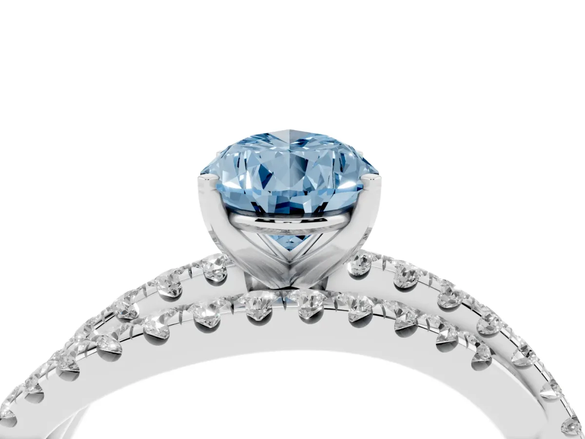 Fancy Blue Pear Cut Solitaire Twist Band with Pavé Setting and Four-Prong Setting Silver