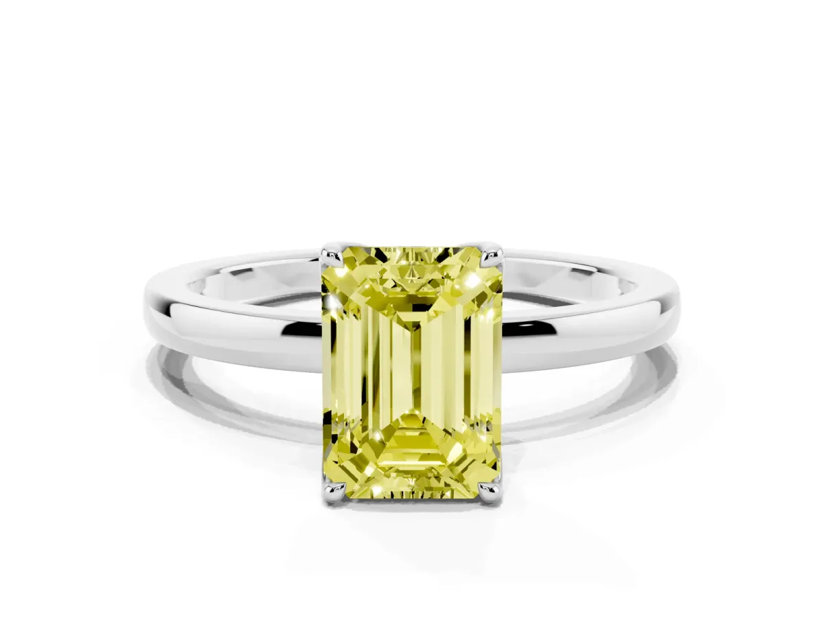 Fancy Yellow Emerald Cut Diamond Solitaire Ring with Thin Band and Prong Setting Silver