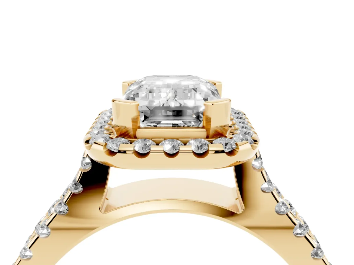 Emerald Cut Diamond Halo Ring with Split Shank Pavé Band and Prong Setting Yellow gold