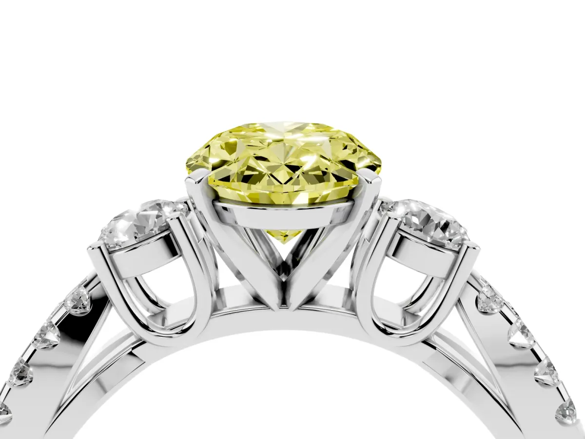 Fancy Yellow Oval Cut Diamond Three-Stone Ring with Pavé Split Shank and Four-Prong Setting Silver