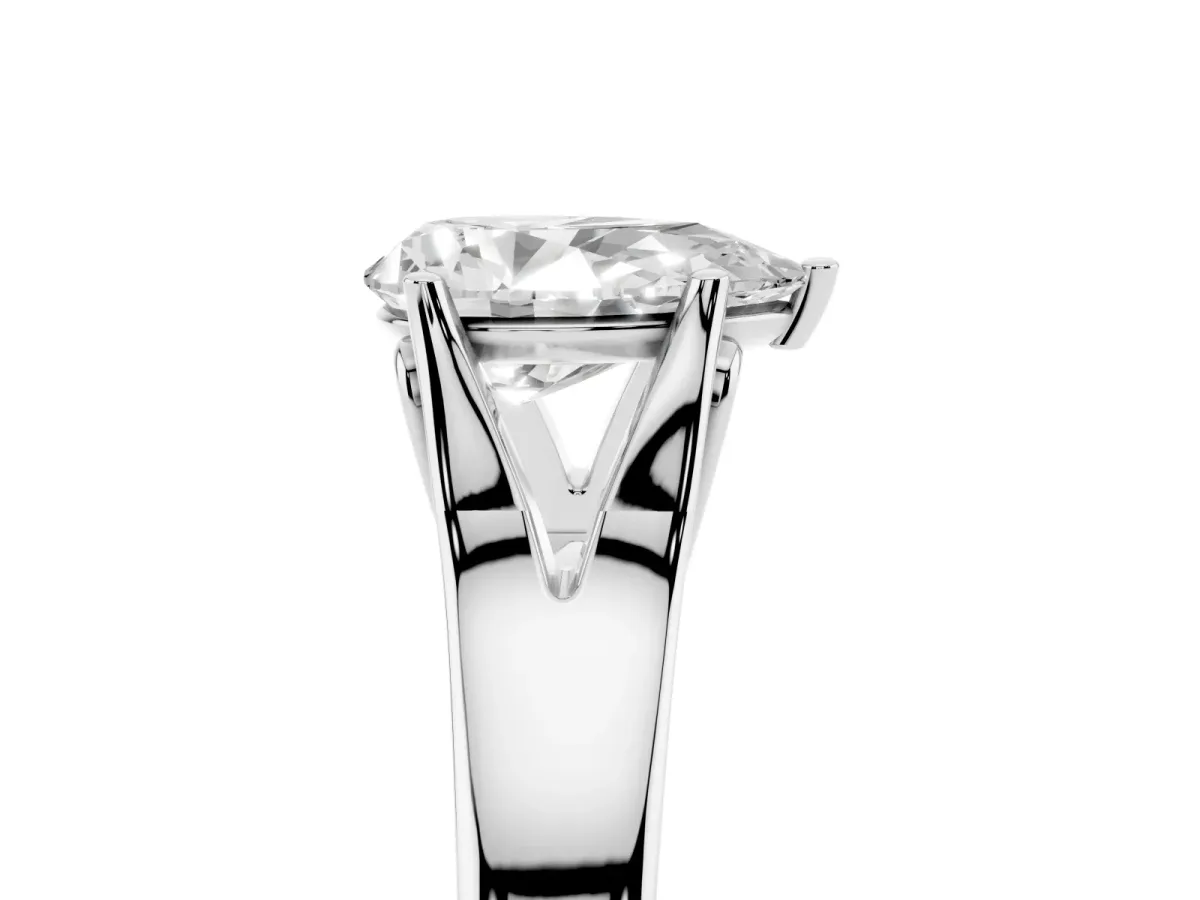 Pear Cut Solitaire Diamond Ring with Cathedral Band and Four-Prong Setting Platinum