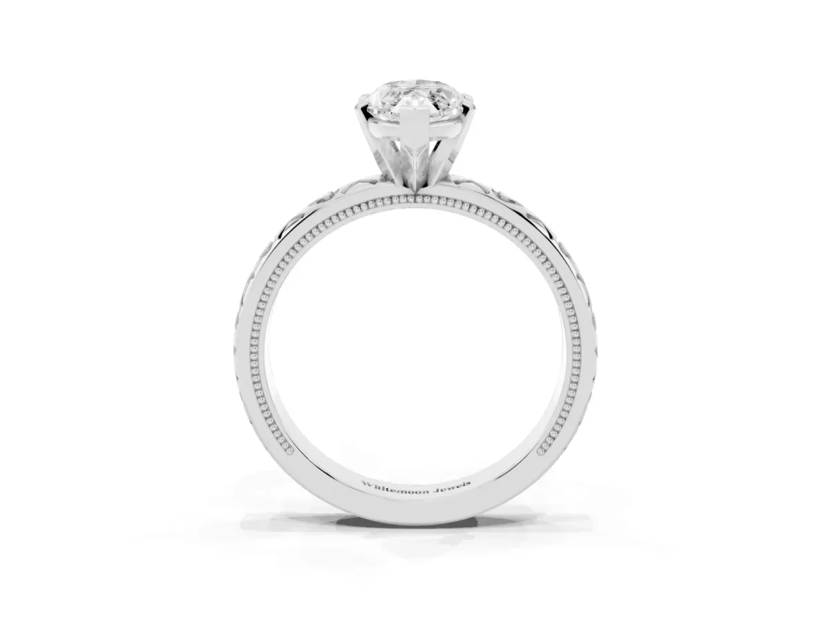 Marquise Cut Solitaire Diamond Engagement Ring with XO Engraved Band and Four-Prong Setting Platinum
