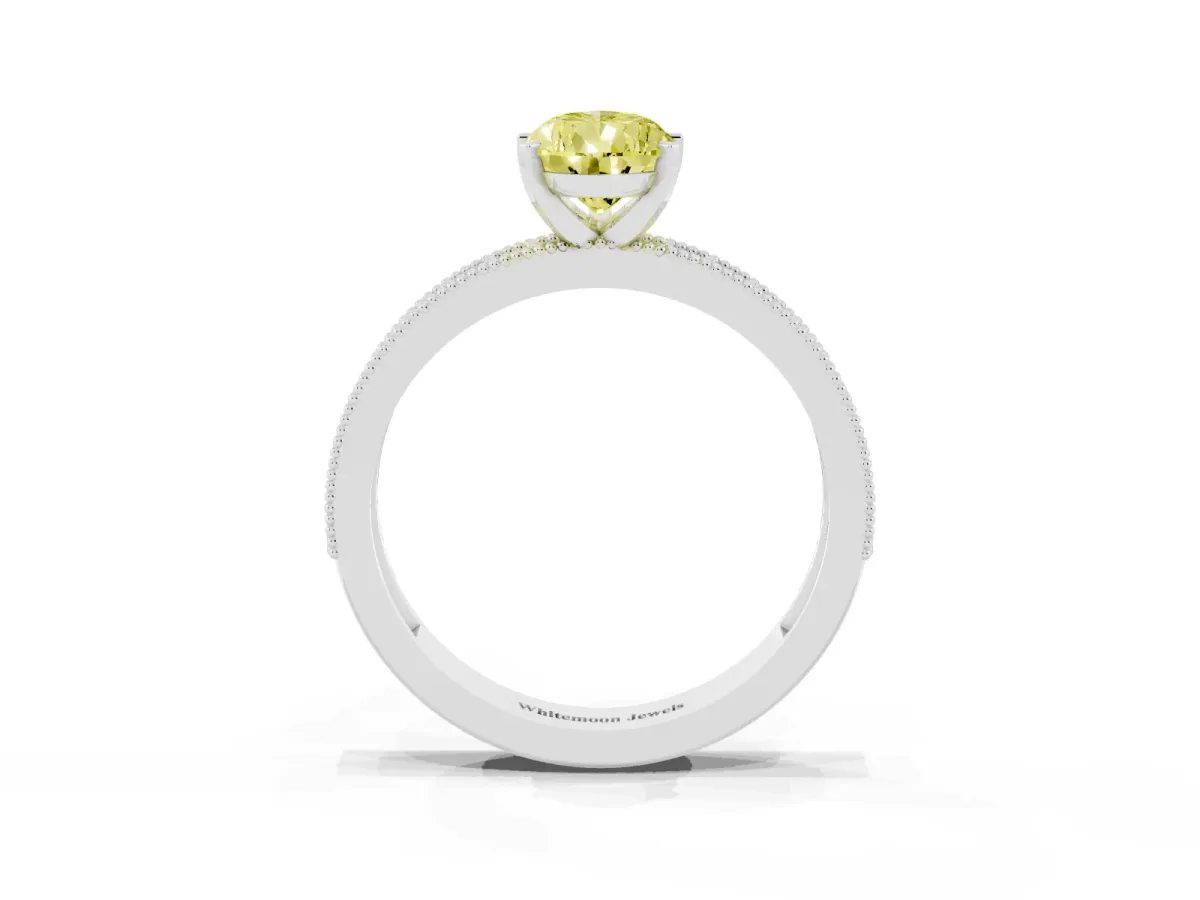 Fancy Yellow Pear Cut Diamond Milgrain Pavé Engagement Ring with Four-Prong Setting Silver