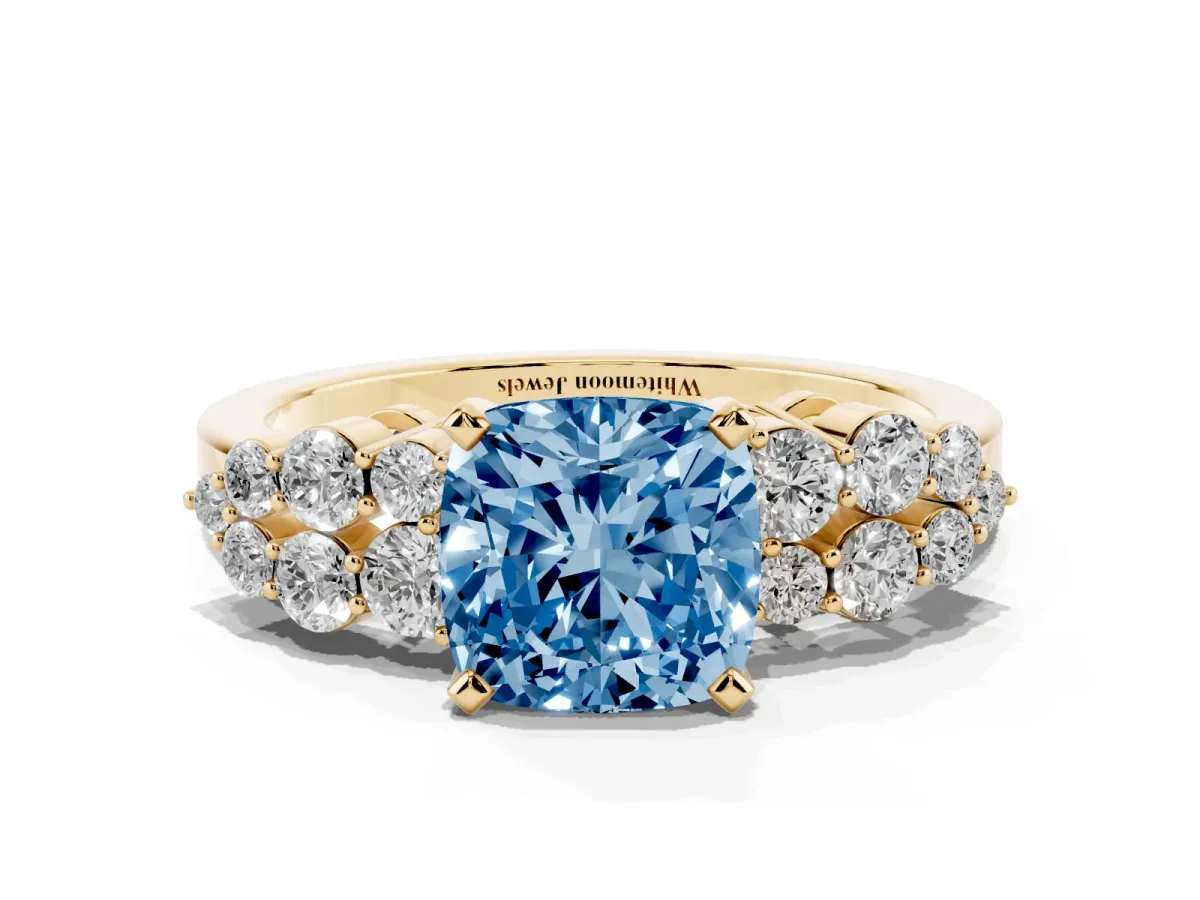 Fancy Blue Cushion Cut Cluster Diamond Engagement Ring with Pavé Band and Four-Prong Setting Yellow gold